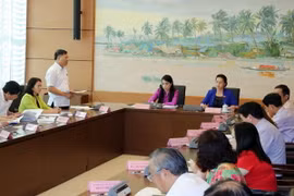 Quang cảnh họp tổ của đoàn đại biểu Quốc hội Vĩnh Phúc, Hà Nam, Quảng Bình và thành phố Cần Thơ. (Ảnh: Trọng Đức/TTXVN
