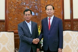 Chủ tịch nước Trần Đại Quang tiếp Đoàn đại biểu Bộ An ninh Lào do Thứ trưởng Kongthong Phongvichit làm Trưởng đoàn. (Ảnh: Nhan Sáng/TTXVN)