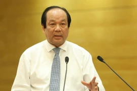 Bộ trưởng, Chủ nhiệm Văn phòng Chính phủ Mai Tiến Dũng trả lời câu hỏi của phóng viên. (Ảnh: Dương Giang/TTXVN)