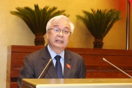 Chủ nhiệm Ủy ban Văn hóa, Giáo dục, Thanh niên, Thiếu niên và Nhi đồng của Quốc hội Phan Thanh Bình trình bày Báo cáo giải trình tiếp thu, chỉnh lý dự án Luật sửa đổi, bổ sung một số điều của Luật Thể dục, thể thao. (Ảnh: Trọng Đức/TTXVN)