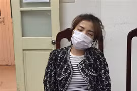 Đối tượng Trần Thị Thanh Hải tại cơ quan công an. (Ảnh: Nguyễn Thắng/TTXVN)