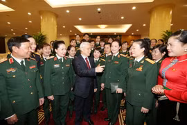 Tổng Bí thư Nguyễn Phú Trọng, Bí thư Quân ủy Trung ương với các đại biểu. (Ảnh: Trí Dũng/TTXVN)