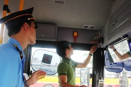 Nhiều đơn vị vận tải vẫn "ngang nhiên" lắp hộp đen "rởm" của nhà sản xuất. (Ảnh: Việt Hùng/Vietnam+)