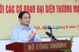 Thủ tướng Phạm Minh Chính phát biểu tại Hội nghị phát triển thị trường với hệ thống Thương vụ Việt Nam ở nước ngoài. (Ảnh: Dương Giang/TTXVN)