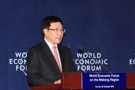 Phó Thủ tướng, Bộ trưởng Bộ Ngoại giao Phạm Bình Minh dự và phát biểu bế mạc Diễn đàn. (Ảnh: Phạm Kiên/TTXVN)