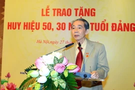 Đồng chí Trương Quang Được tại buổi Lễ trao tặng Huy hiệu 50 năm tuổi Đảng. (Ảnh: An Đăng/TTXVN)