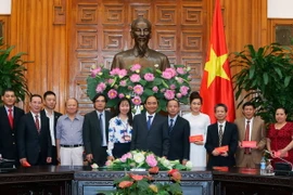 Thủ tướng Nguyễn Xuân Phúc với các đại biểu. (Ảnh: Thống Nhất/TTXVN)