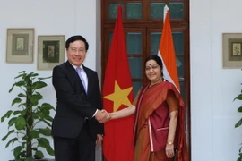 Phó Thủ tướng, Bộ trưởng Ngoại giao Phạm Bình Minh gặp và hội đàm với Bộ trưởng Ngoại giao Ấn Độ Sushama Swaraj. (Ảnh: Huy Bình/TTXVN)