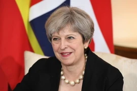 Thủ tướng Anh Theresa May tại một sự kiện ở London ngày 13/7. (Nguồn: AFP/TTXVN)