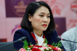 Nhà báo Tạ Bích Loan trong buổi gặp gỡ báo chí sáng 27/3 tại Hà Nội. (Ảnh: PV/Vietnam+)