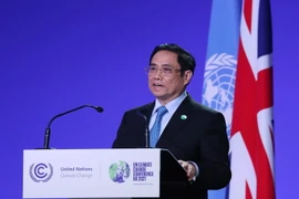 Thủ tướng Phạm Minh Chính phát biểu tại Hội nghị lần thứ 26 các Bên tham gia Công ước khung của Liên hợp quốc về Biến đổi khí hậu (COP26). (Ảnh: Dương Giang/TTXVN)