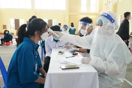 [Photo] Nghệ An tiêm vaccine phòng COVID-19 cho trẻ từ 12-17 tuổi