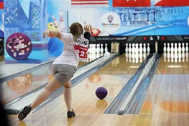 Vận động viên nước Thái Lan - Chawakorn Wutti thực hiện phần ném bóng trong nội dung thi Đơn nữ. (Ảnh: Trung Kiên/TTXVN)