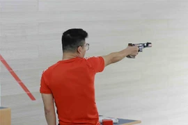 Vận động viên Hà Minh Thanh (Việt Nam) giành huy chương Vàng nội dung súng ngắn bắn nhanh nam 25m. (Ảnh: Vũ Sinh/TTXVN)