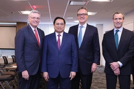 Thủ tướng Phạm Minh Chính tiếp ông Al Kelly, Chủ tịch kiêm Giám đốc điều hành Tập đoàn VISA. (Ảnh: Dương Giang/TTXVN)