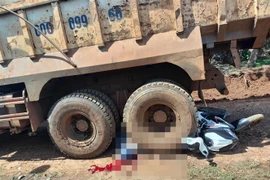 Hiện trường vụ tai nạn tại Bình Phước. (Ảnh: TTXVN phát)