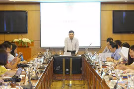Phó Chánh Văn phòng phụ trách Văn phòng Bộ Tư pháp Nguyễn Quốc Hoàn phát biểu. (Ảnh: Doãn Tấn/TTXVN)