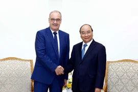 Thủ tướng Nguyễn Xuân Phúc tiếp Bộ trưởng Kinh tế, Giáo dục và Nghiên cứu Liên bang Thụy Sĩ Guy Parmelin. (Ảnh: Thống Nhất/TTXVN)