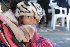 Đoàn người di cư đổ về trung tâm cứu trợ ở sân vận động Jesus Martinez Palillo, thủ đô Mexico City. (Ảnh: Việt Hùng/Vietnam+)