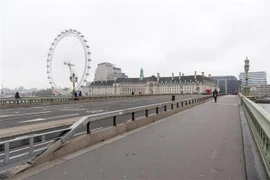 Cảnh vắng vẻ tại trung tâm London, Anh do tác động của dịch COVID-19 ngày 19/3/2020. (Ảnh: THX/TTXVN)
