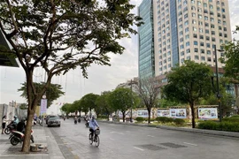 Đường Nguyễn Huệ, Quận 1. (Ảnh: Hồng Giang/TTXVN)