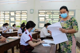 Học sinh Tiền Giang. (Ảnh minh họa: Hữu Chí/TTXVN)