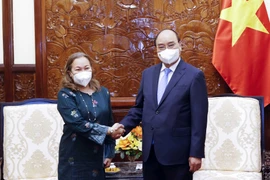 Chủ tịch nước Nguyễn Xuân Phúc tiếp bà Dato Sharifah Norhana Syed Mustaffa, Đại sứ Malaysia tại Việt Nam. (Ảnh: Thống Nhất/TTXVN)
