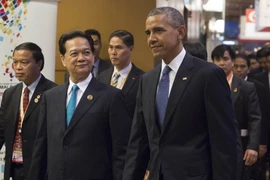 Thủ tướng Nguyễn Tấn Dũng (trái) và Tổng thống Mỹ Barack Obama (phải) tại Hội nghị Cấp cao ASEAN-Mỹ. (Nguồn: AFP/TTXVN)