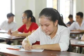 Thí sinh làm bài thi môn Lịch sử. (Nguồn: TTXVN)