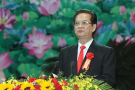 Thủ tướng Nguyễn Tấn Dũng, Chủ tịch Hội đồng Thi đua-Khen thưởng Trung ương phát động thi đua tại Đại hội. (Ảnh: TTXVN) 