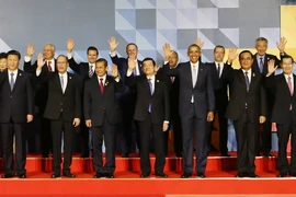 Chủ tịch nước Trương Tấn Sang chụp ảnh chung với lãnh đạo các nền kinh tế APEC. (Ảnh: Nguyễn Khang/TTXVN)