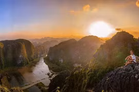 Bình minh trên đỉnh Hang Múa. (Ảnh: CTV)