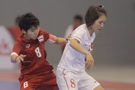 Nữ futsal Việt Nam không thể tạo nên bất ngờ. (Ảnh; Quang Nhựt/TTXVN)