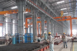 Doanh nghiệp Thép đầu tư công nghệ, đáp ứng các tiêu chuẩn cao của thị trường. (Ảnh: Xuân Quảng/Vietnam+)