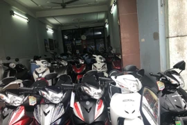 Tang vật được phát hiện là hàng hóa gồm tem , logo “Cub”, “super CUB”, logo “cánh chim”. (Ảnh: Đức Duy/Vietnam+)