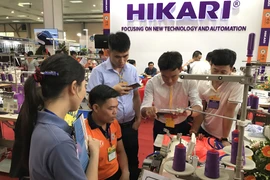 Triển lãm dệt may là cơ hội tốt để các doanh nghiệp tìm kiếm đối tác, mở rộng thị trường. (Ảnh: Đức Duy/Vietnam+)