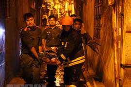 Vụ cháy xảy ra tại trọng tại số nhà 37 ngách 29/70 phố Khương Hạ, quận Thanh Xuân. (Ảnh: Phạm Kiên/TTXVN)