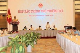 Bộ trưởng Trần Văn Sơn chủ trì phiên họp báo Chính phủ thường kỳ ngày 4/7, tại Hà Nội. (Ảnh: Đức Duy/Vietnam+)