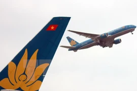 Máy bay của Vietnam Airlines cất cánh tại sân bay quốc tế Nội Bài. (Ảnh: Huy Hùng/TTXVN)