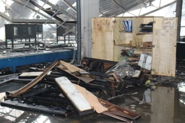 Hiện trường vụ cháy đã được dập tắt. (Ảnh: Nguyễn Văn Việt/TTXVN)