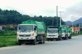 Người dân phong tỏa bãi rác Nam Sơn đã dỡ lán, cho xe lưu thông. (Ảnh: H.V/Vietnam+)