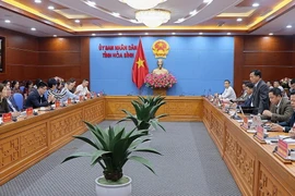 Quang cảnh cuộc làm việc giữa tỉnh Hòa Bình với đoàn công tác. (Ảnh: Thanh Hải/TTXVN)