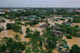 Lũ lớn trên sông Hiếu gây ngập diện rộng tại khu vực xã Thanh An, huyện Cam Lộ, tỉnh Quảng Trị. (Ảnh: Hồ Cầu/TTXVN) 