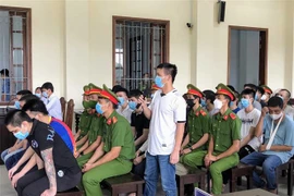 Các bị cáo tại phiên xét xử. (Ảnh: TTXVN phát) 