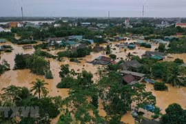 Lũ lớn trên sông Hiếu gây ngập diện rộng tại khu vực xã Thanh An, huyện Cam Lộ, tỉnh Quảng Trị. (Ảnh: Hồ Cầu/TTXVN) 