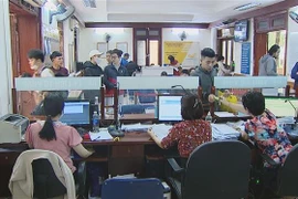 Hà Nội khắc phục tình trạng quá tải cấp phiếu lý lịch tư pháp. (Ảnh: Kim Anh/TTXVN)