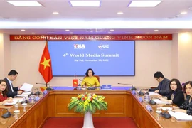 Đoàn đại biểu Thông tấn xã Việt Nam do Tổng giám đốc Vũ Việt Trang dẫn đầu tham dự Hội nghị tại điểm cầu Hà Nội. (Ảnh: Văn Điệp/TTXVN) 