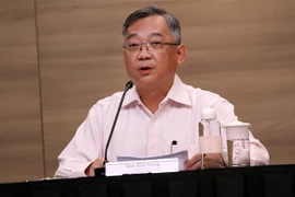Bộ trưởng Y tế Singapore Gan Kim Yong tại cuộc họp báo ngày 24/3/2021. (Nguồn: MCI/TTXVN) 