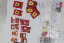 Tang vật công an thu giữ. (Ảnh: TTXVN phát)