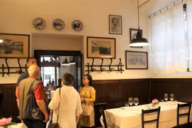 Không gian tưởng niệm Bác Hồ bên trong quán Antica Trattoria della Pesa. (Ảnh: Trường Dụy/TTXVN) 